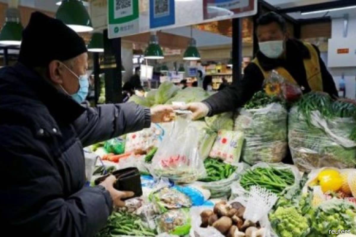 China's slow consumer inflation, deepening factory gate deflation to test policy